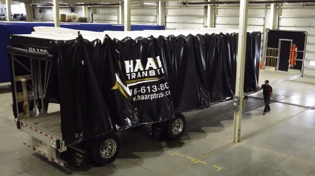 Double Drop Trailers vs Step Deck Trailers mostly closed tarp Double Drop Trailers vs Step Deck Trailers mostly closed tarp